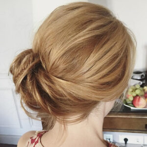 23. Easy Twisted Side Bun ​